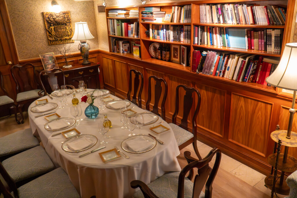 Amalur private room: oval table set for a seated dinner of up to 10 guests