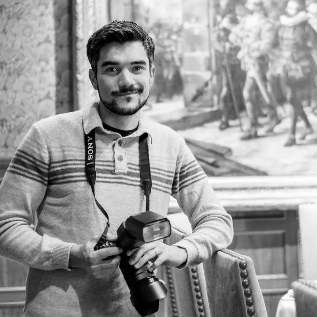 Meet our team: Ricardo Tena holding a camera