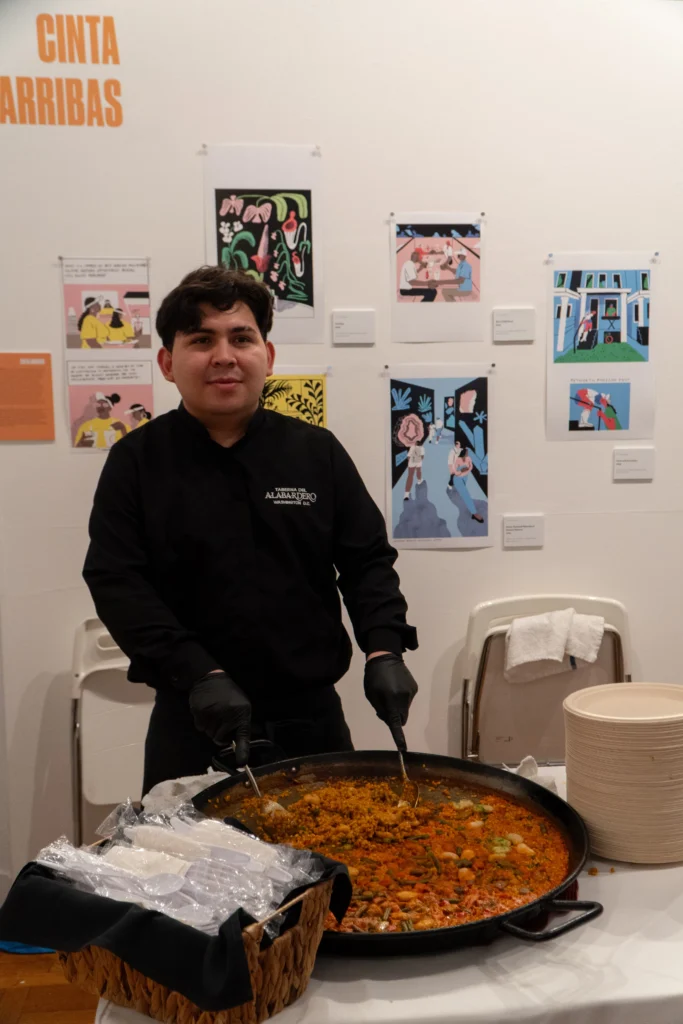 Catering: cook serving paella at a catered event