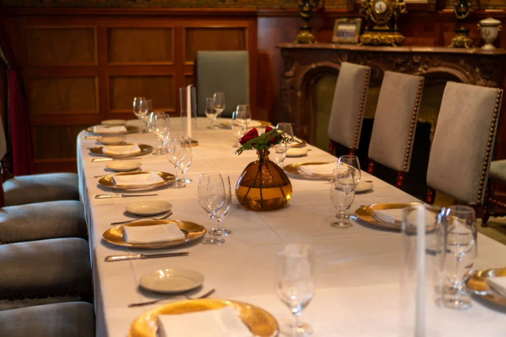 Aranjuez private room: long table set for a seated dinner of up to 24 guests