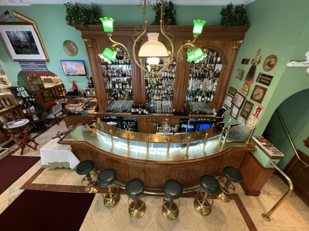 Bar at Taberna del Alabardero: illuminated bar seen from above