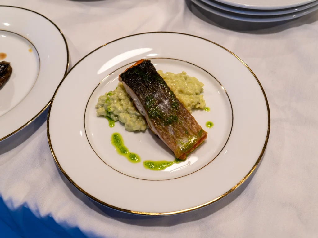 Catering: plated fish with pureed vegetables at a catered event