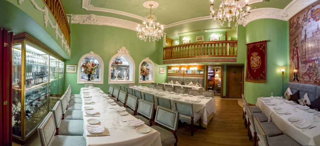 La Granja private room: panoramic view with long tables set for up to 48 seated guests