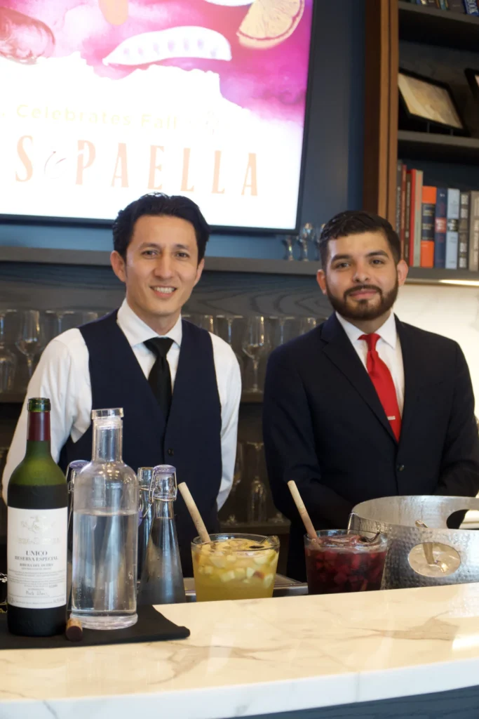 Catering: two bartenders behind the bar at a catered event