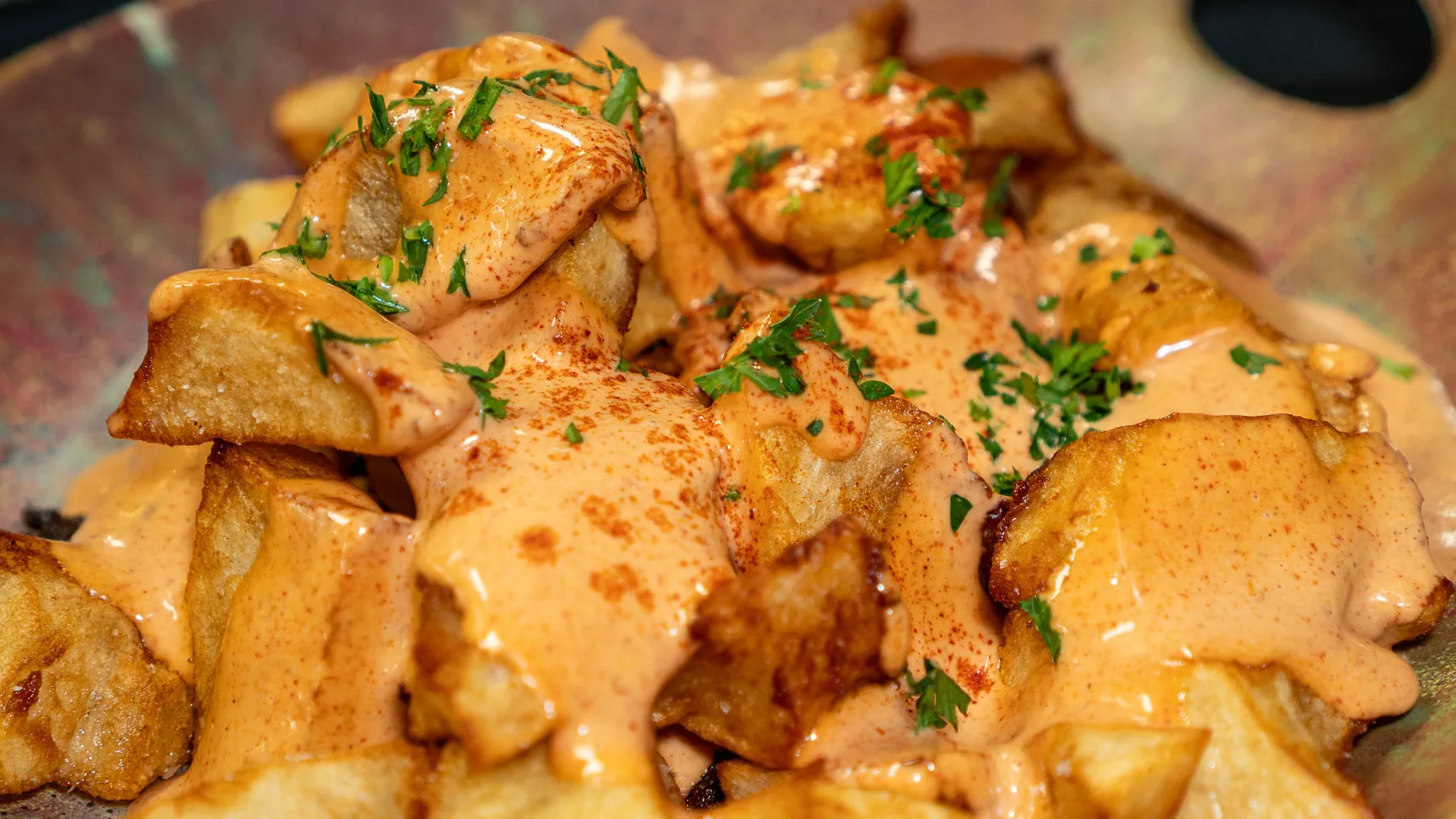 Our latest post: patatas bravas with sauce and herbs